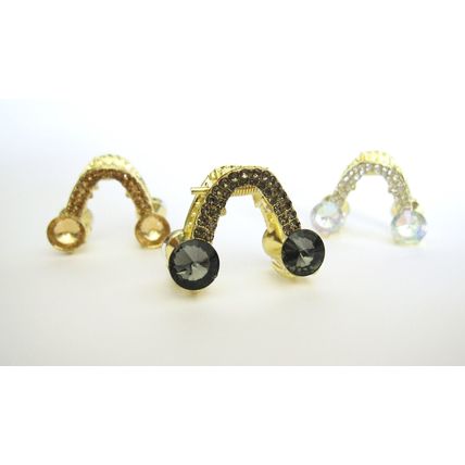Small shiny gold metal triangle arc hair claw clip with crystals