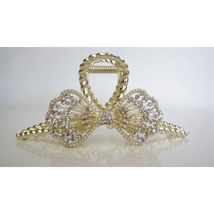 Long one sided round crystal bow gold metal hair claw clip for medium thick hair