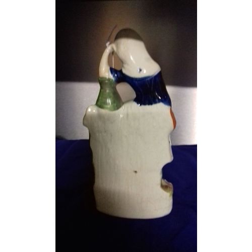 Staffordshire Bo Peep . i dont think so anyway . Girl with lamb.