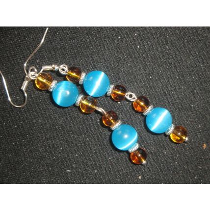 Vibrant baby blue cats eye & amber yellow crystal glass long swing earrings