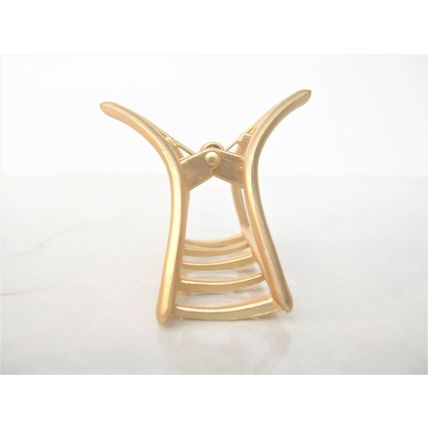 Medium/small gold metal star flower or triangle hair claw clip