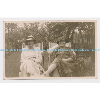 C014634 Two Woman Sitting on the Chair in Garden