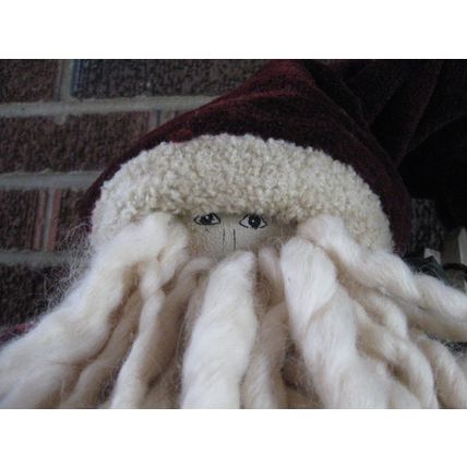 Santa Claus Doll in Burgundy Outfit w/very long cap, bird and evergreens
