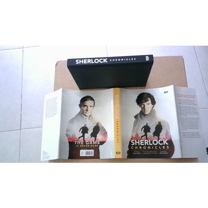 SHERLOCK: CHRONICLES by Steve Tribe (First Edition Hardback) BBC Books (2014)