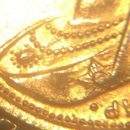 1/2 Sovereign Jewellers copy mounted In a Metal Pendant With chain hole.