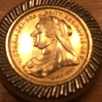 1/2 Sovereign Jewellers copy mounted In a Metal Pendant With chain hole.