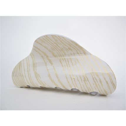 Long creme white blonde and gold hair claw clip