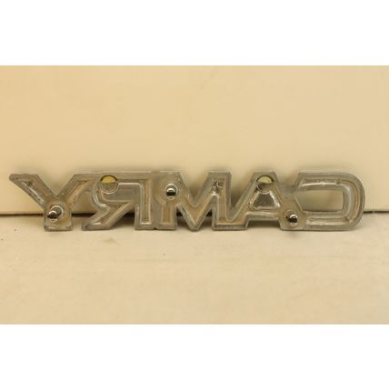 1987-1991 Toyota ‘Camry’ White Letter Plastic Trunk Emblem OEM 7140