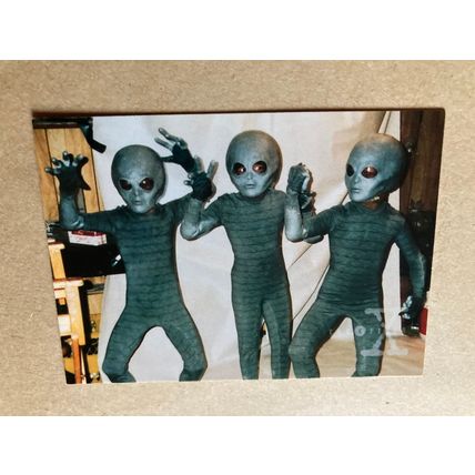 The X-Files Season 2 Base trading Card # 47 Alien Costume Check (A) 1996 Topps
