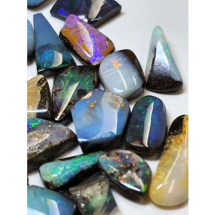54156.0 - 50 Small Boulder Opal Free Cut Polished Faces 56.46 cts 6 - 14 mm High