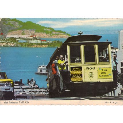 Postcard Cable car on Hyde Street, San Francisco. View of Alcatraz and Bay