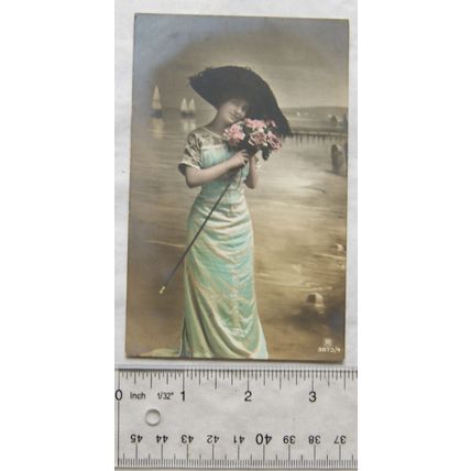 vintage Greetings postcard - Woman in Large Hat Holding Flowers