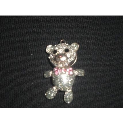 Silver tone fully articulated arms head legs with pink crystals pendant necklace