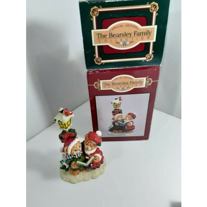 the Beasley Family Collection teddy bears caroling by a light pole
