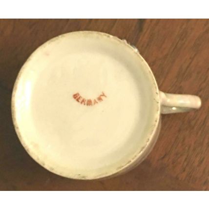 Baby Cup with raised "Baby and flowers" Germany Motto China - Antique