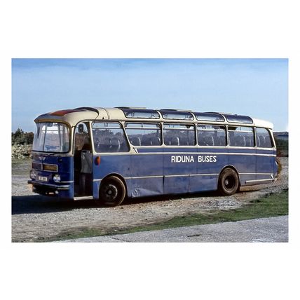 pu1039 - Riduna Buses Bus reg no AY305 at Alderney - photograph 6x4