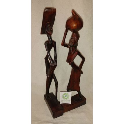 PAIR of HANDCARVED AFRICAN WOODEN SCULPTURES MAN w HAT & DRUM and WOMAN w BUNDLE