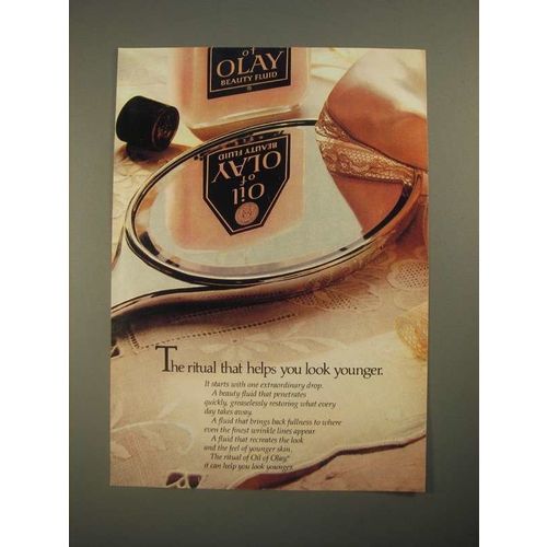 1987 Oil of Olay beauty fluid Ad - Helps You Look Younger