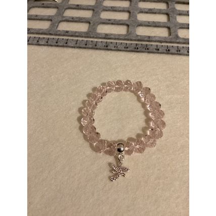 Light pink glass bead bracelet with dragonfly charm