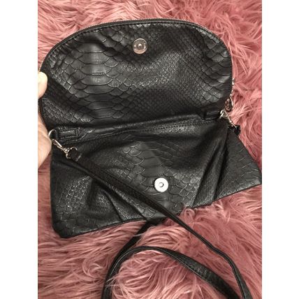 Kate Hill crossbody women's black handbag. Can be folded