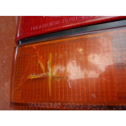 1986 87 88 Chevy Sprint LH Tail Light OEM Tokaidenso 35701-8203L 35655-8203L