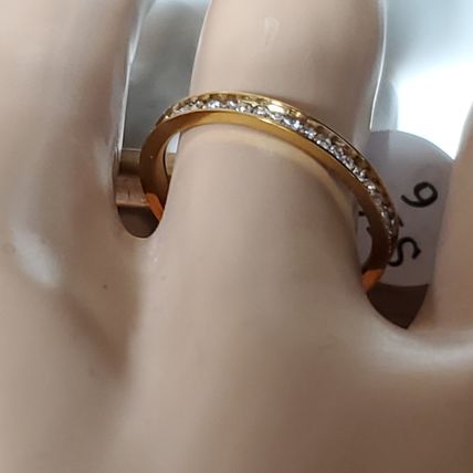 Mia Wedding Band. Yellow Gold Plated Stainless Steel. AAA CZ in full circle