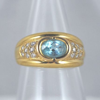 Massive solid gold ring with blue bezel set topaz Stamped fine gold jewelry