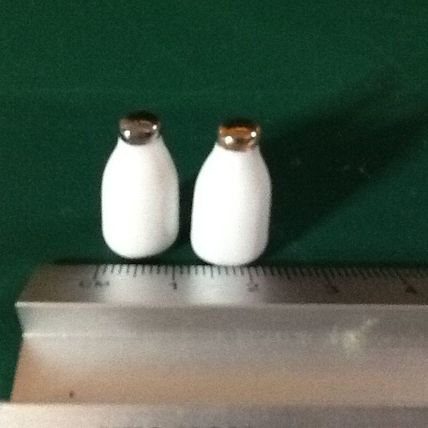 2 Ceramic Milk Bottles