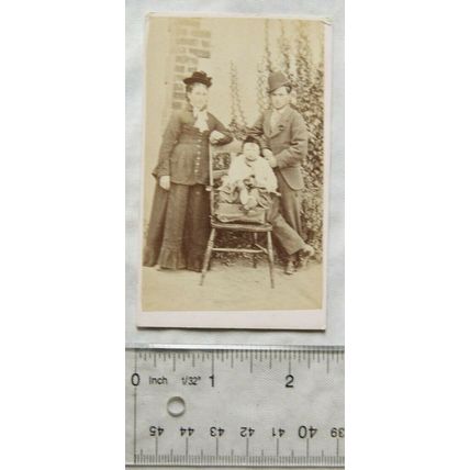 Carte-de-visite of a couple & baby in a garden - Little Tom