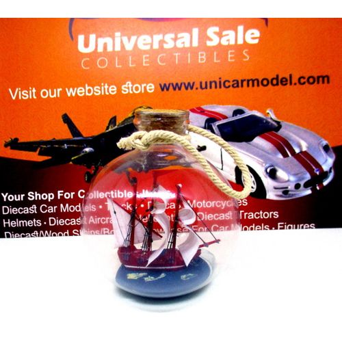 LITTLE SAILING BOAT IN A GLASS BALL, WOODEN NAUTICAL COLLECTOR'S MODEL