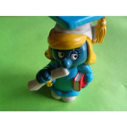 Graduation graduate smurfette in a all blue robe gown and hat
