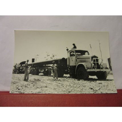 photograph of a LARGE PIPE CARRYING TRUCK overseas 14 x 9 cms