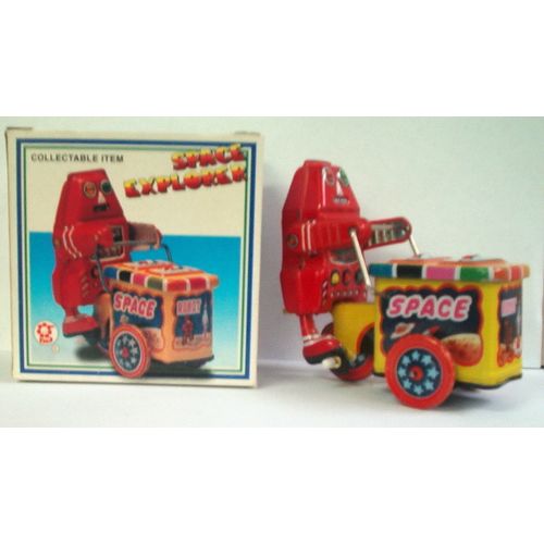 SPACE EXPLORER pedaling ice cream wind - up ( 1990's )