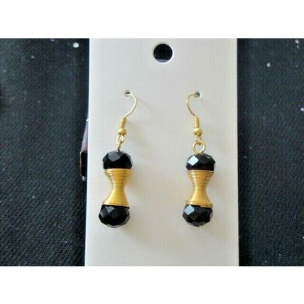 Elegant black crystal glass beads mounted on gold golden coil dangle earrings