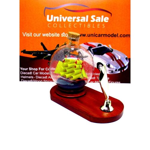 LITTLE SAILING BOAT IN A GLASS BALL ON WOOD PEN STAND,WOODEN NAUTICAL MODEL