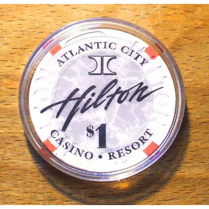 (1) $1. HILTON CASINO CHIP - 1996 - ATLANTIC CITY, New Jersey