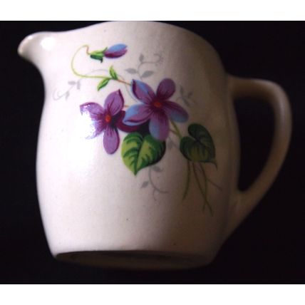 Cream jug miniature by New Devon Pottery with floral design circa 1935