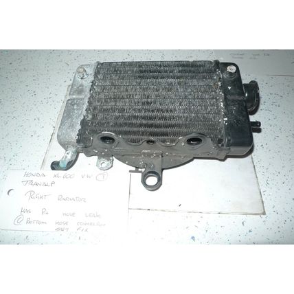 HONDA XL600 V TRANS ALP RIGHT RADIATOR (PIN HOLE REPAIR REQUIRED) (CON-F)