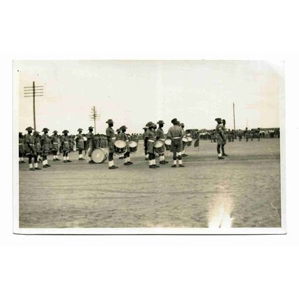 Postcard-size photo British colonial soldiers parade band King's African Rifles?