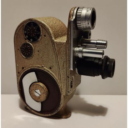 Vintage GB Bell & Howell 605 Double Run Eight cine camera. Case fairly scratched