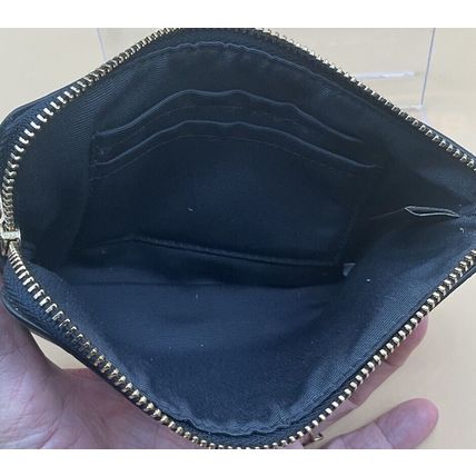 A Cute Coach Blue Zip Wristlet Leather With Heart Print