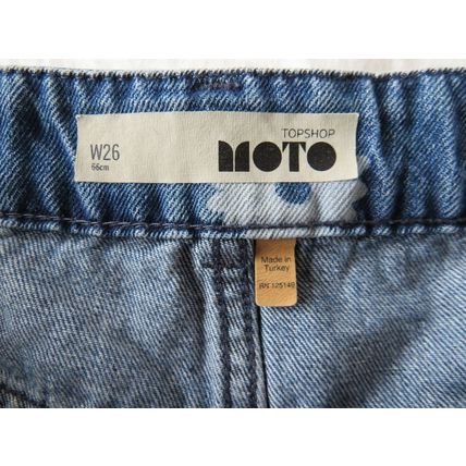 Topshop Moto blue denim shorts, flower print motifs. W26