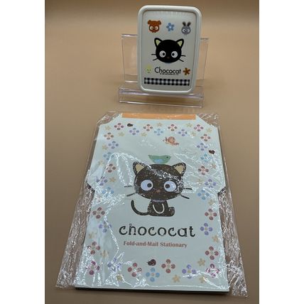 This is a very sweet vintage Sanrio 2005 lot of two Chococat items for