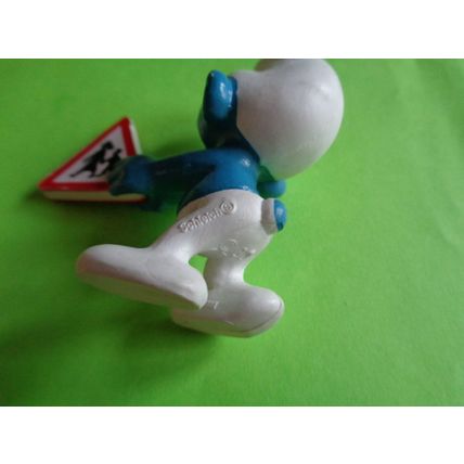Smurf with a children crossing traffic safety sign