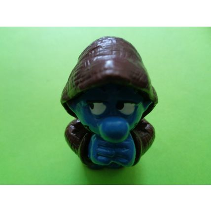 Smurf dressed up as a praying monk