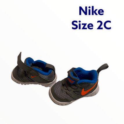 pair of toddler Nike shoes boys