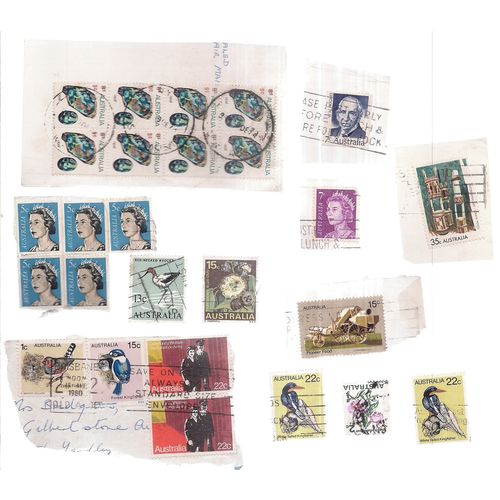 27 x AUSTRALIA stamps on and off paper