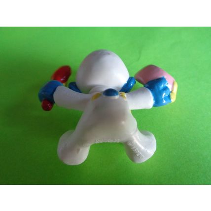 Baby smurf with spoon and bowl