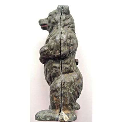 CHERISHED VINTAGE CAST METAL BEAR MONEY BOX FROM 1946.