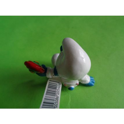 Baby smurf sitting up with rattle and label 2004